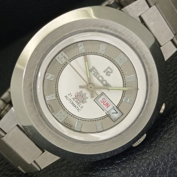 Vintage 1980 Ricoh Automatic Mens Silver Watch W/daydate & Gray accents - Picture 1 of 10